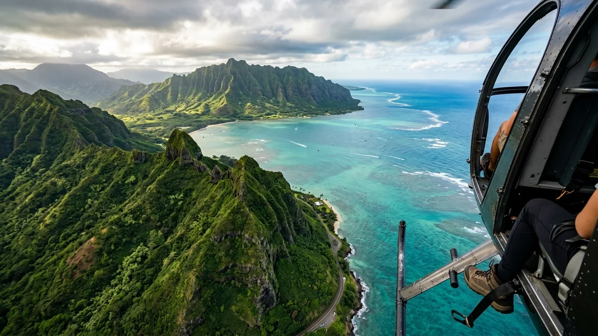 Cinematic doors-off helicopter tour soaring above emerald Koolau ridges in Oahu